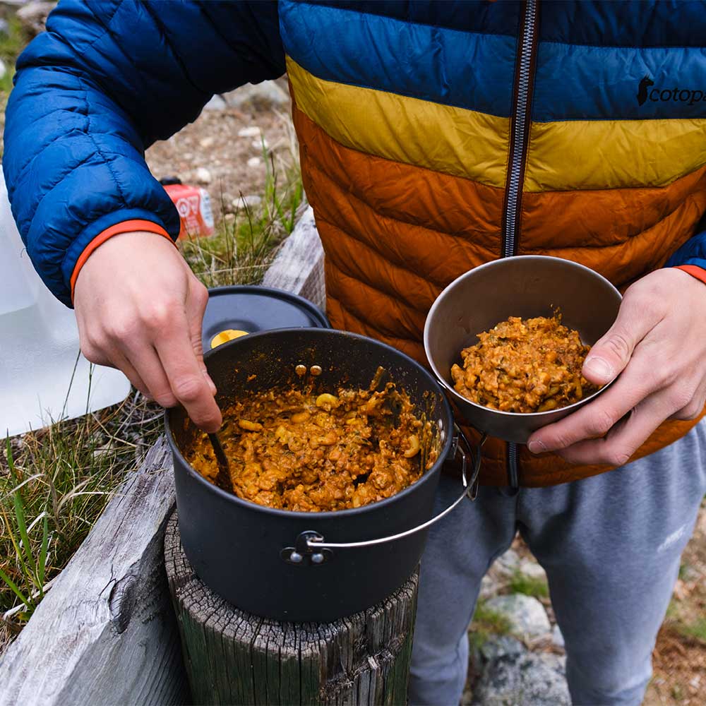 RightOnTrek backcountry chili meal in bowl being served