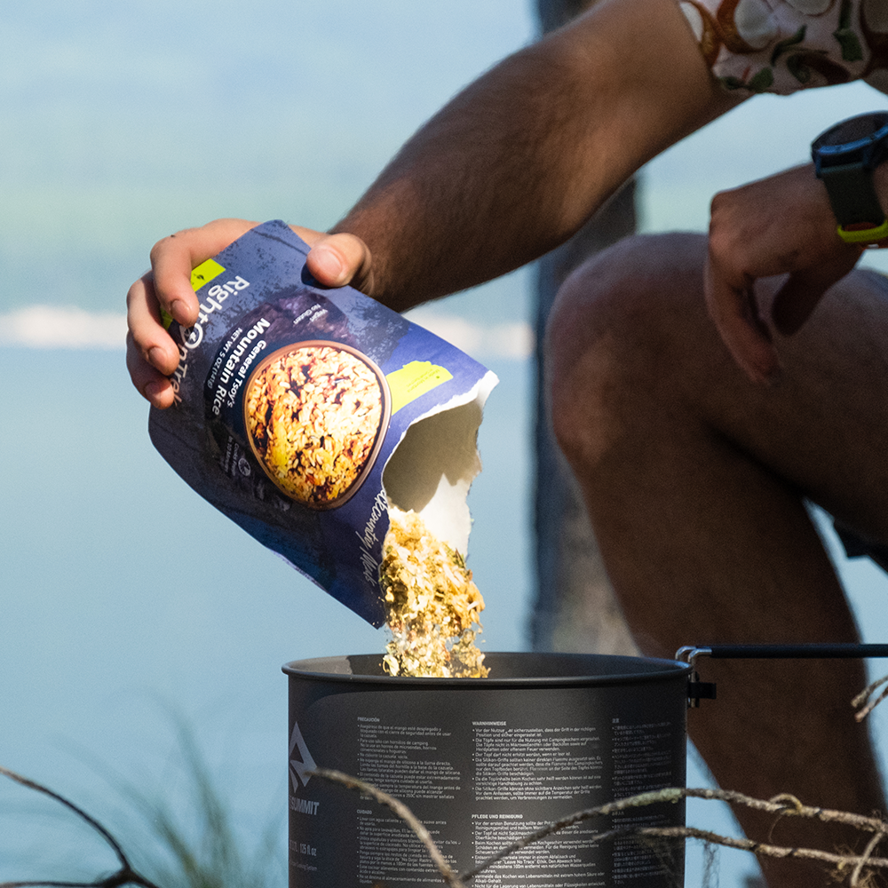 RightOnTrek general tsoy's mountain rice pouring from package into a cooking pot